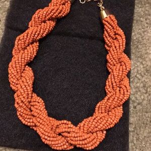 Twisted beaded necklace.